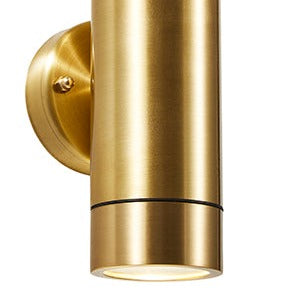 Our Lucas brass double up and  down outdoor wall mounted single cylinder outdoor light would look perfect in a modern or more traditional home design. Outside wall lights can provide atmospheric light in your garden, at the front door or on the terrace as well as a great security solution. It is designed for durability and longevity with its robust material producing a fully weatherproof and water-resistant light fitting. Use LED bulbs to make this light energy efficient and low cost to run.
