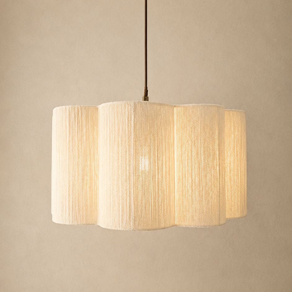 Ceiling light fixture with a textured lampshade on a beige background
