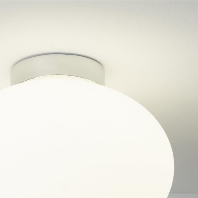 Add a touch of modern elegance to your home with our Frazer semi-flush ceiling light. The light has been handblown to create something spectacular, this opal glass light fitting with a chrome ceiling plate is ideal for the modern home. Dimmable light fitting compatible with a dimmable bulb. 