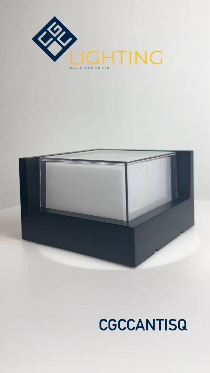 Load video: Sophia black and white square wall light is an modern simple fitting with a black polycarbonate body and opal diffuser. This stylish wall light is perfect for adding a pinch of modern flavour to doorways, sheds, patios, porch, driveways, garages, sheds, and more. This fitting is IP65 rated which makes it fully weatherproof light fitting.
