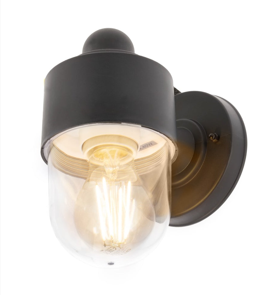Our Veronica black wall light would look perfect in a modern or more traditional home design. Outside lights can provide atmospheric light in your garden, at the front door or on the terrace as well as a great security solution. It is designed for durability and longevity with its robust material producing a fully weatherproof and water resistant light fitting. This outdoor wall light comes in a black polycarbonate finish and projects a generous spread of illumination across your home or garden.
