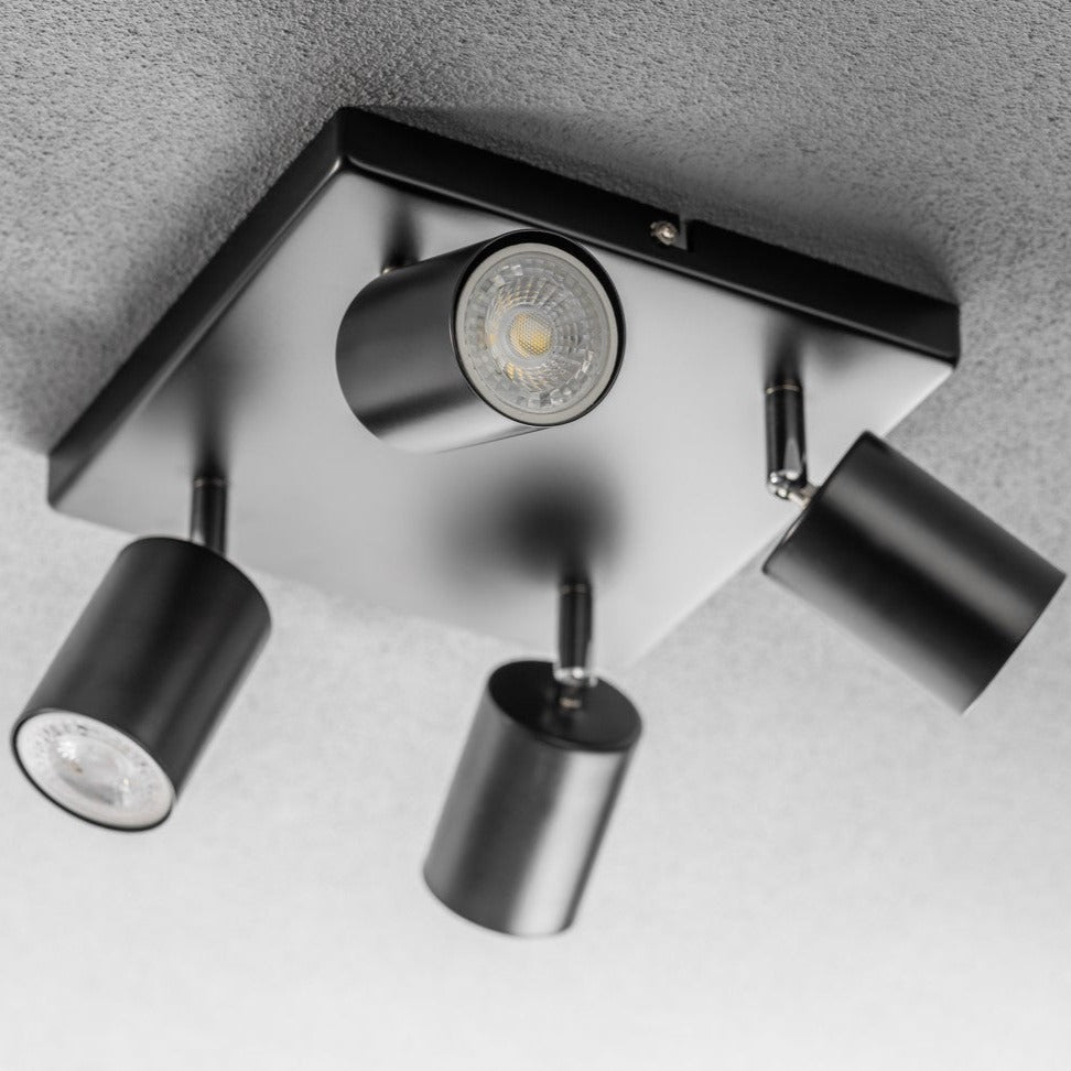Light up your room with our Jack 4 light square spotlight plate, with 4 adjustable light heads allowing you to efficiently provide your space with personalised task lighting to resolve all your lighting needs. Finished in black, this retro inspired ceiling light adds a warm touch of colour to your room, creating the perfect accent lighting feature
