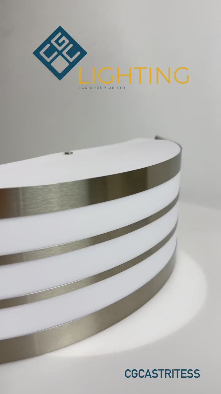 Load video: Stylish Striker with a shade made of polycarbonate is a hemispherical outdoor lamp holder, made of stainless steel, decorated with additional, narrower stripes. The surface distributes the light of the lamp softly and evenly, creating an atmospheric, pleasant light even outdoors.