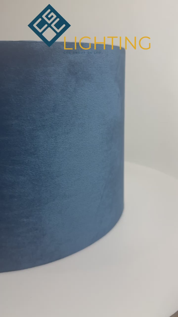 Load video: Our Nila velvet shade is sophisticated in appearance and we have designed the shade to  suit a range of interiors. Easy to fit, it’s crafted from high-quality velvet on the outer and has a reflective gold metallic inner. It&#39;s made to fit both a ceiling light or lamp base.