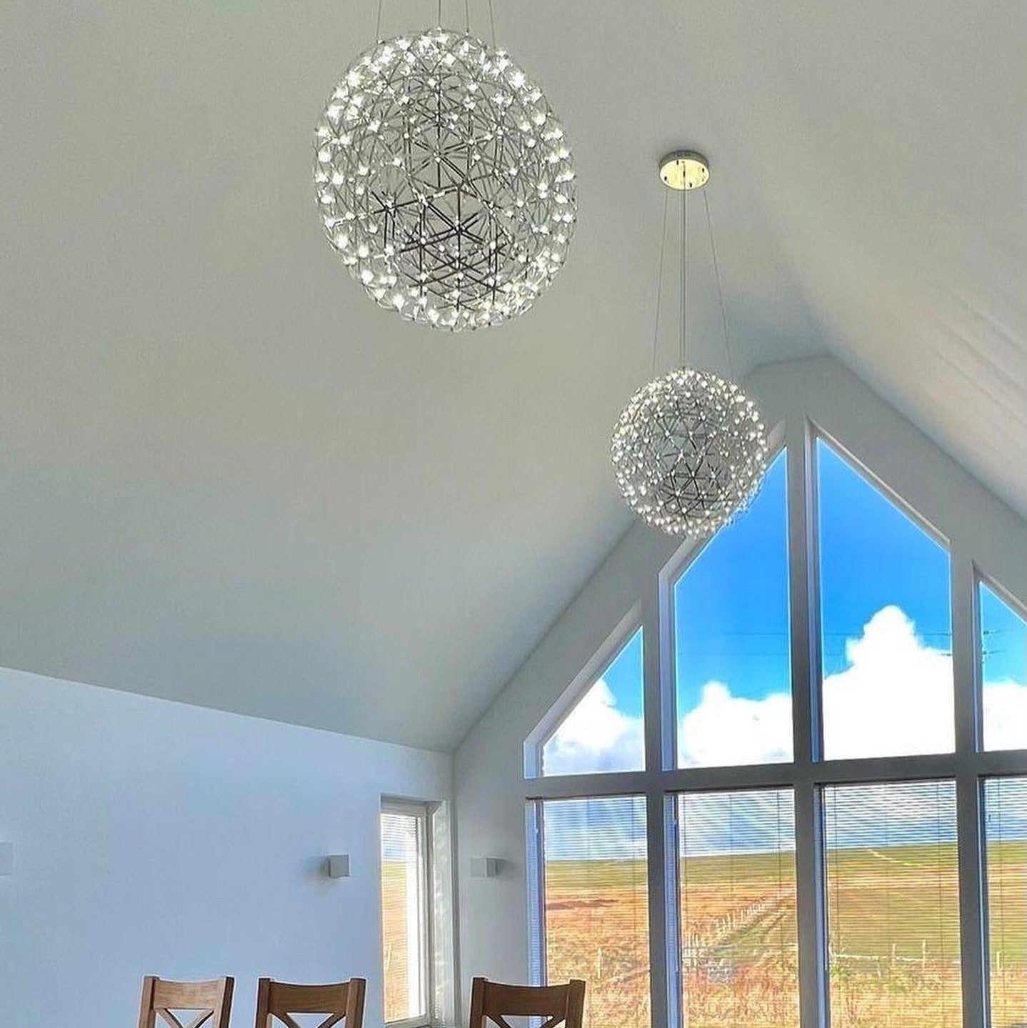 Our striking silver starburst light is inspired by elements of the night sky, comprising of delicately crafted steel and covered in LED lights  The light will create a talking point in any space and can be placed together with the other size starburst lights to create something truly spectacular 