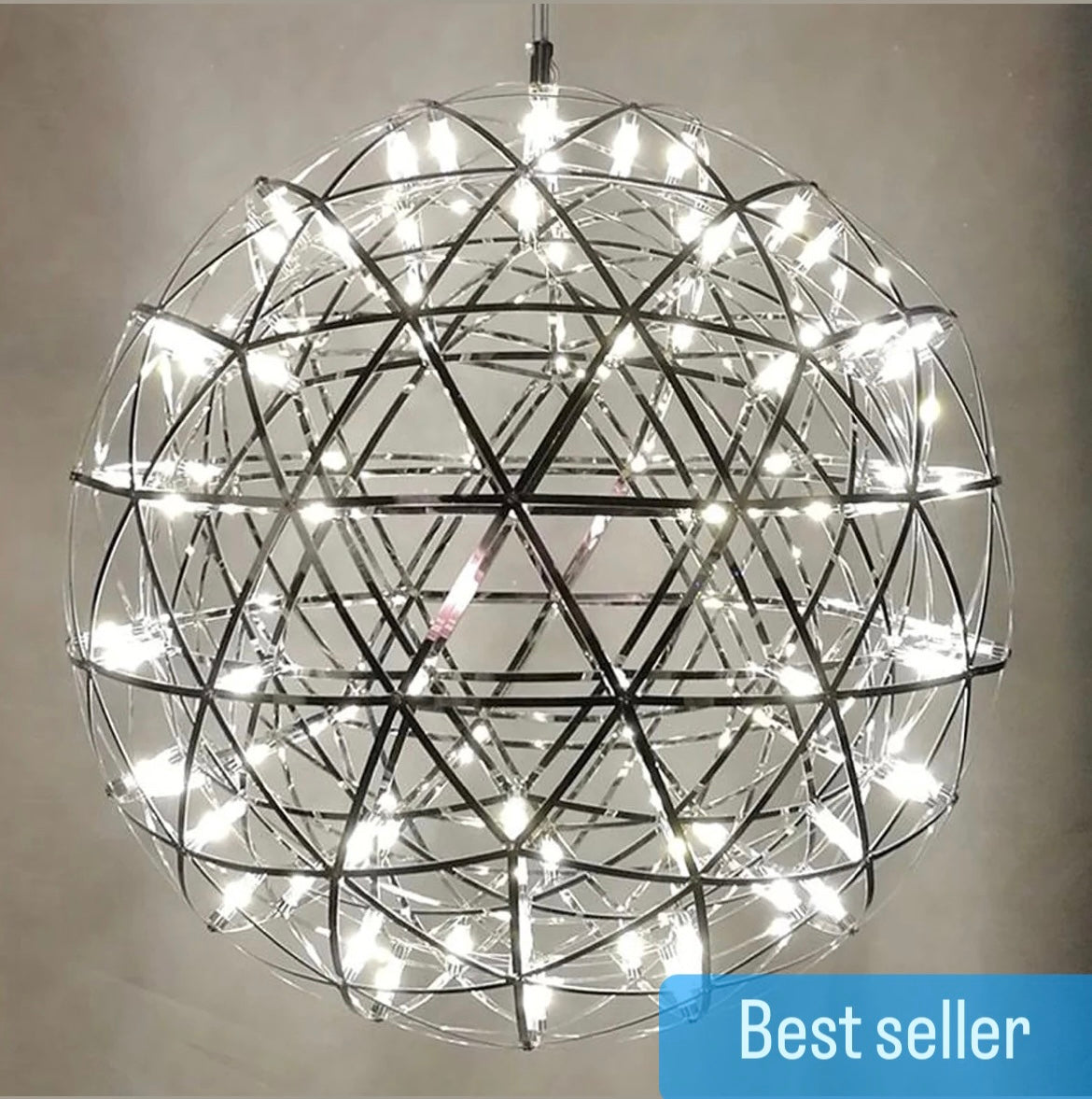  Our striking 40cm large silver starburst light is the perfect way to make a statement with your interiors. It is inspired by elements of the night sky, comprising of a delicately crafted stainless steel round spherical shape and perfectly finished in LED lights  This LED starburst sparkle pendant light will create a talking point in any space and can be placed together with the other size starburst lights to create something truly spectacular