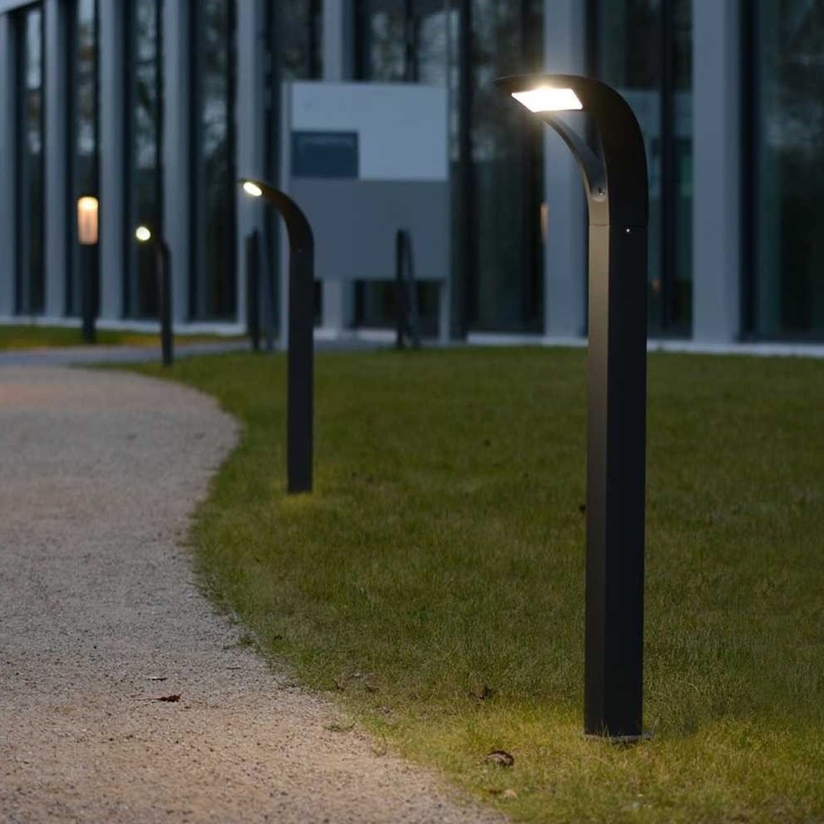 Our Diana dark grey curved post light combines style and energy efficiency. Constructed from a die cast aluminum making this light fitting fully weatherproof and durable designed longevity. The powerful light output illuminates a large area but is deigned not to dazzle. Perfect for lighting outside modern homes driveways, patios, gardens as well as bars, clubs, hotels.  Matching wall light available.
