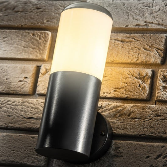 Our Humera black wall mounted round cylinder outdoor light would look perfect in a modern or more traditional home design. Outside wall lights can provide atmospheric light in your garden, at the front door or on the terrace as well as a great security solution. It is designed for durability and longevity with its robust material producing a fully weatherproof and water resistant light fitting.