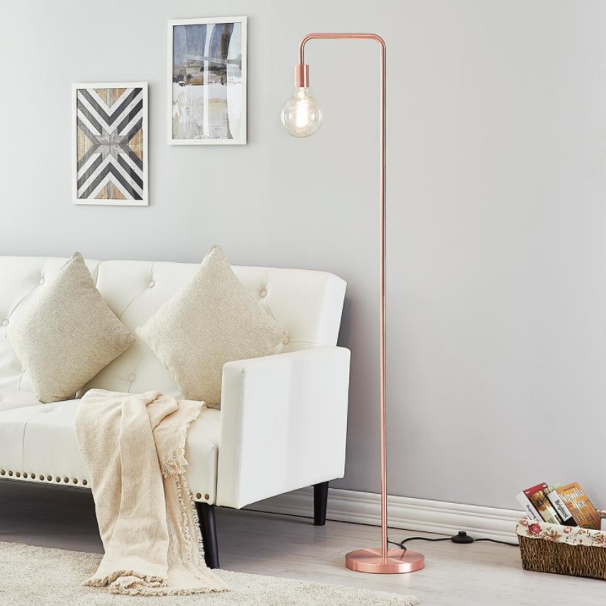 Our Caitlin floor lamp features an angular metal frame to bring a hint of industrial style to your interior. Add a filament bulb for an extra special effect. Finished in brushed copper.