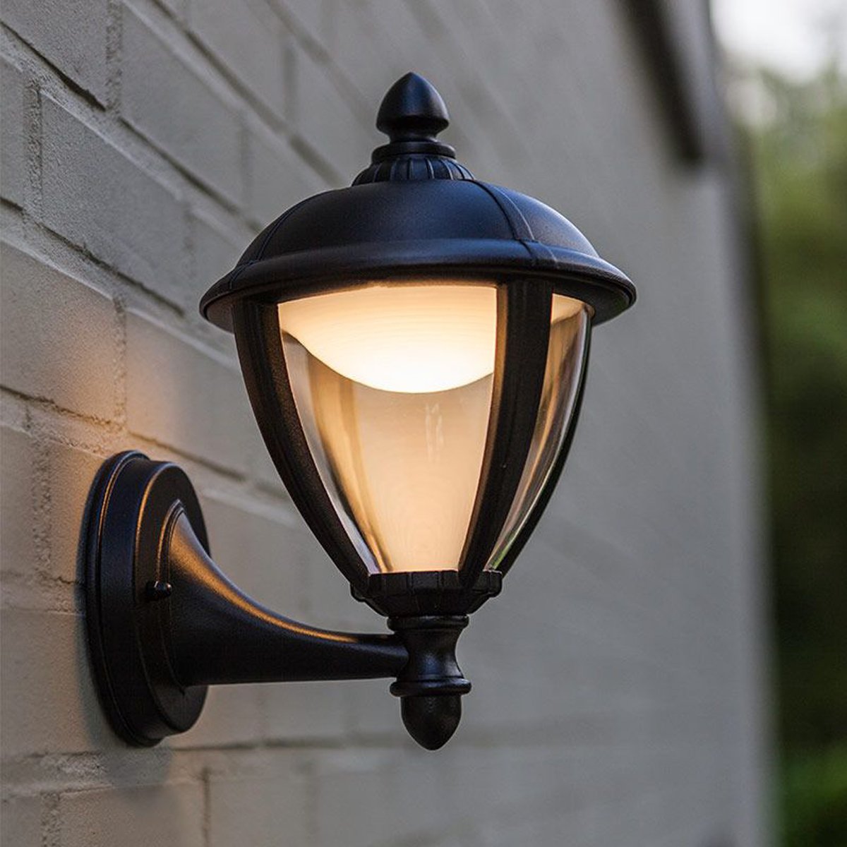 Our Cindy lantern wall light delivers on style and durability and is a smart choice for your exterior lighting. With its black aluminium construction teamed with clear panes, this lantern is hardwearing and rust and weatherproof. Built for life outdoors, it has an IP44 rating which means it can withstand the harshest of weather conditions. For sophisticated yet robust outdoor lighting, our Cindy black outdoor traditional lantern is a strong contender.