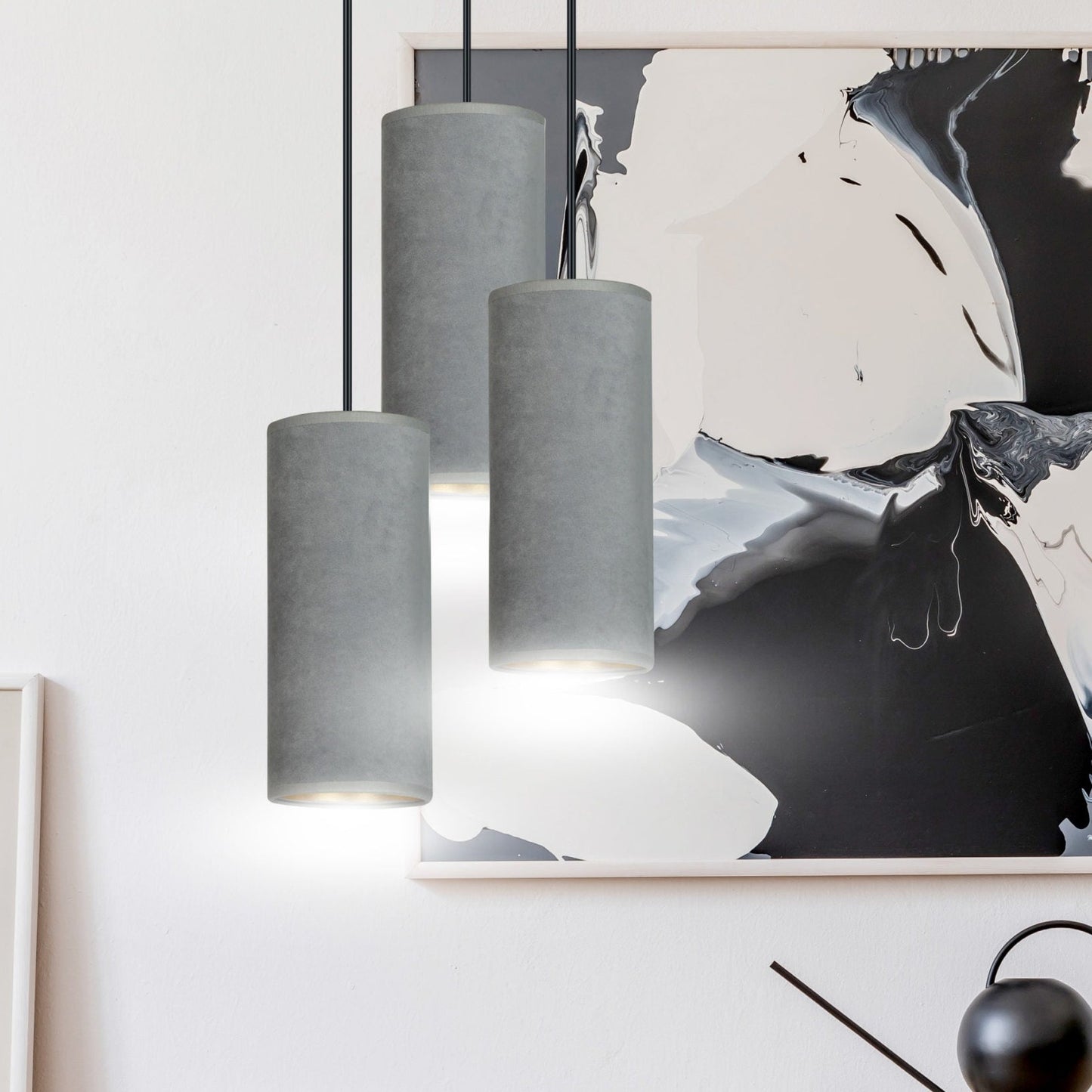 Our Bente wall light is modern and contemporary in its design which is inspired by the industrial trend with a touch of opulence. The velvet effect shades are made from a luxury grey fabric creating a stand out feature for any living, dining or bedroom. The cable is adjustable up to 100cm to suit your desired look.