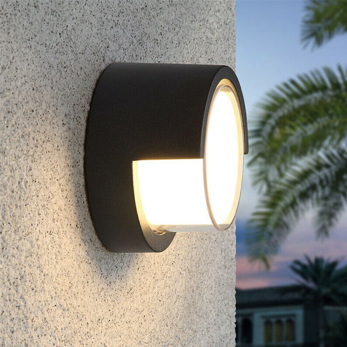Sophia black and white round wall light is an modern simple fitting with a black polycarbonate body and opal diffuser. This stylish wall light is perfect for adding a pinch of modern flavour to doorways, sheds, patios, porch, driveways, garages, sheds, and more. This fitting is IP65 rated which makes it fully weatherproof light fitting.