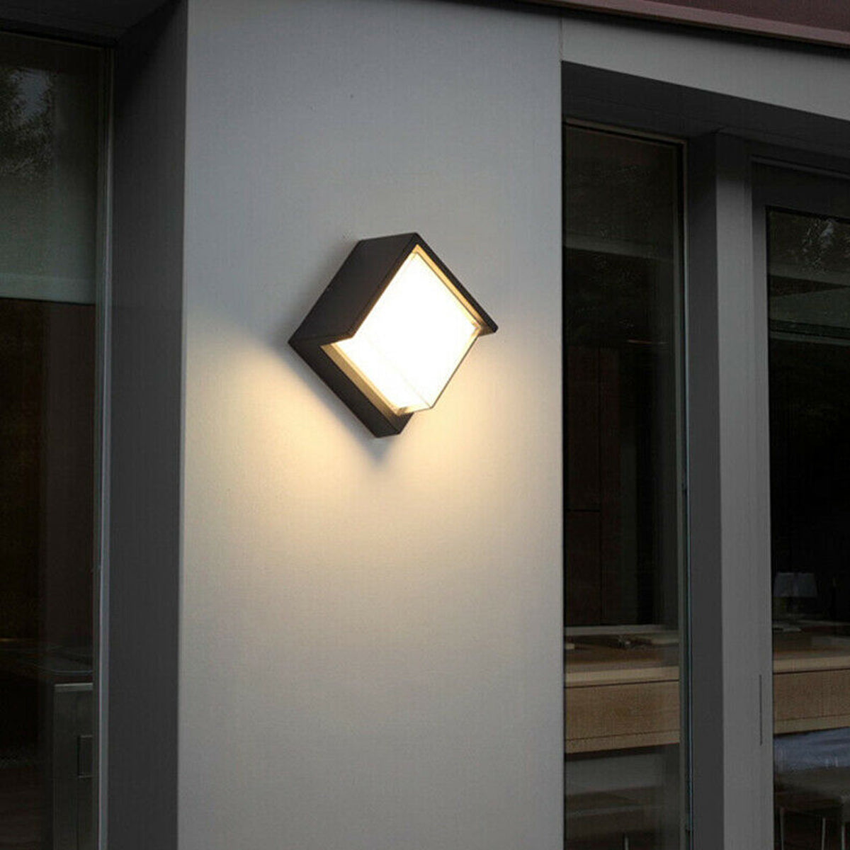 Sophia black and white square wall light is an modern simple fitting with a black polycarbonate body and opal diffuser. This stylish wall light is perfect for adding a pinch of modern flavour to doorways, sheds, patios, porch, driveways, garages, sheds, and more. This fitting is IP65 rated which makes it fully weatherproof light fitting.
