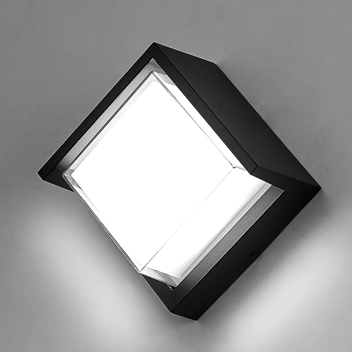 Sophia black and white square wall light is an modern simple fitting with a black polycarbonate body and opal diffuser. This stylish wall light is perfect for adding a pinch of modern flavour to doorways, sheds, patios, porch, driveways, garages, sheds, and more. This fitting is IP65 rated which makes it fully weatherproof light fitting.