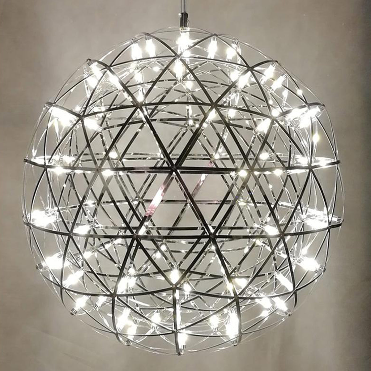 Our striking silver starburst light is inspired by elements of the night sky, comprising of delicately crafted steel and covered in LED lights  The light will create a talking point in any space and can be placed together with the other size starburst lights to create something truly spectacular 