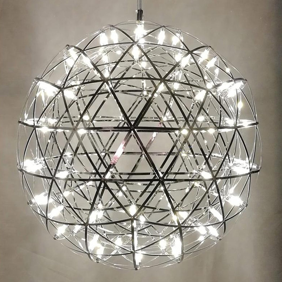  Our striking 40cm large silver starburst light is the perfect way to make a statement with your interiors. It is inspired by elements of the night sky, comprising of a delicately crafted stainless steel round spherical shape and perfectly finished in LED lights  This LED starburst sparkle pendant light will create a talking point in any space and can be placed together with the other size starburst lights to create something truly spectacular