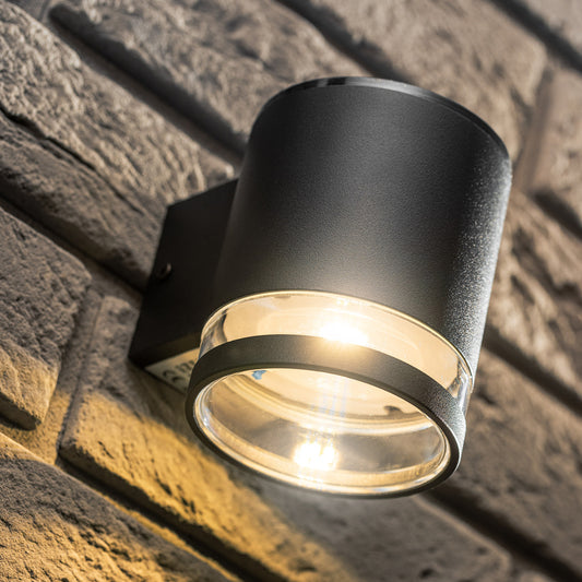 Our Bex solar powered wall light delivers on style and durability and is a smart choice for your exterior lighting. With its modern black matt heavy duty aluminium construction and polycarbonate clear diffuser, this wall light is hardwearing and weatherproof.  For sophisticated yet robust outdoor lighting with no wiring required our Bex solar black outdoor modern wall light is a strong contender.