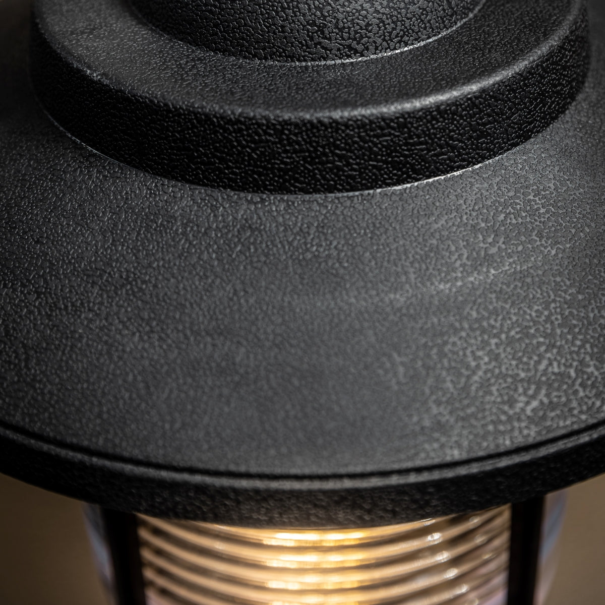 The Jemima black fisherman hooked outdoor wall lantern light is constructed of polycarbonate and features an attractive design inspired by traditional lighting styles. This lantern wall light is a great choice for illuminating doorways and porches, creating a warm and inviting look and a safe environment. With an IP44 safety rating, the Jemima garden wall light is suitable for mounting on outdoor walls.