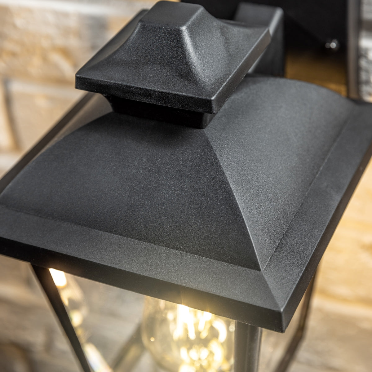 Our Hope lantern wall light delivers on style and durability and is a smart choice for your exterior lighting. With its black polycarbonate construction teamed with polycarbonate panes, this lantern is hardwearing and rust and weatherproof. Built for life outdoors, it has an IP44 rating which means it can withstand the harshest of weather conditions. For sophisticated yet robust outdoor lighting, our Yasmin black outdoor traditional lantern is a strong contender.