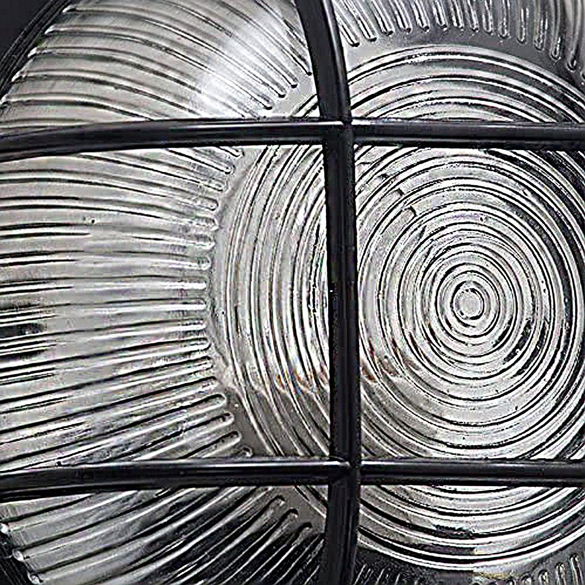 Ronnie cage round bulkhead is an optimal choice for illuminating doorways, patios, porches, driveways, garages, and sheds. Crafted of durable plastic with a glass prismatic diffuser, it offers a timeless aesthetic with reliable performance.