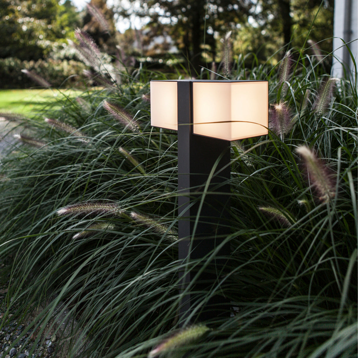 Come browse our Morgan dark grey double cube outdoor post light by CGC Interiors. This cube light installed in your home’s exterior space, creating an atmospheric lighting system for your garden, front door, or driveway to provide style and an extra security solution. The clever construction of this light allows you to adjust the light to your desired style and light output.