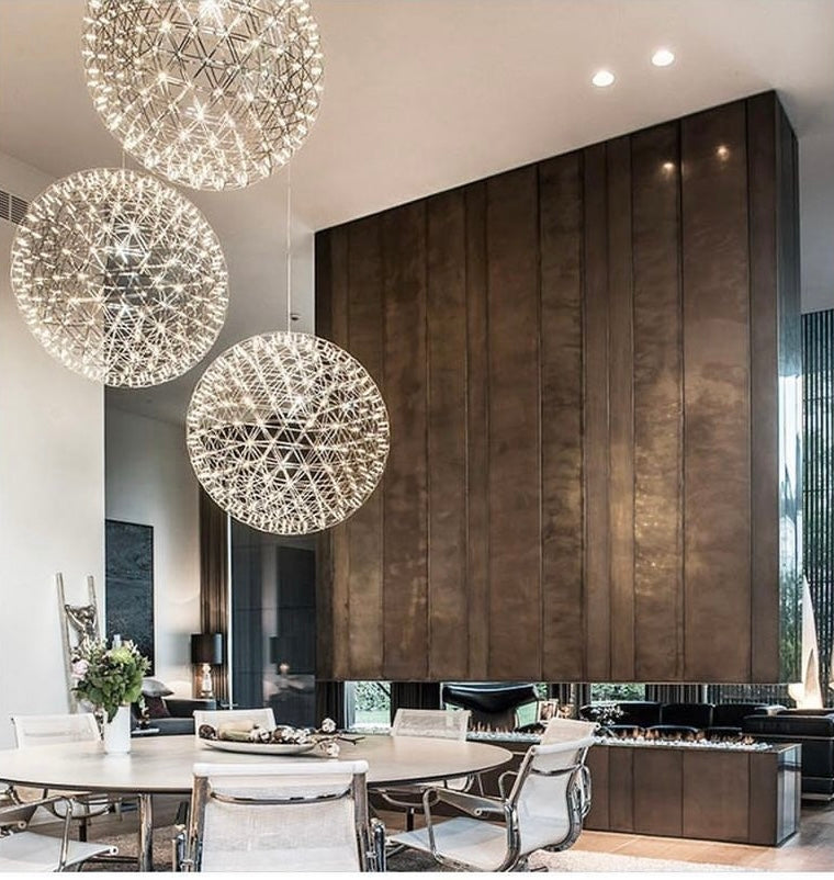  Our striking 60cm XL silver starburst light is the perfect way to make a statement with your interiors. It is inspired by elements of the night sky, comprising of a delicately crafted stainless steel round spherical shape and perfectly finished in LED lights This LED starburst sparkle pendant light will create a talking point in any space and can be placed together with the other size starburst lights to create something truly spectacular