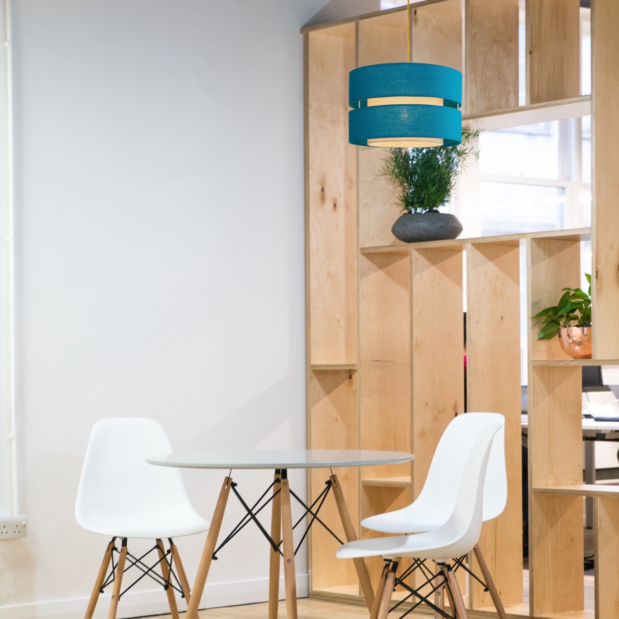 Our Gayle two tiered luxury fabric double layered shade is contemporary in its appearance and we have designed the shade to suit a range of interiors. Easy to fit simply attached to an existing pendant flitting.  It is crafted from high quality fabric material in two layers and complimented with a white inner which looks beautiful when light shines through. The shade has been made to fit both a ceiling light or lamp base.