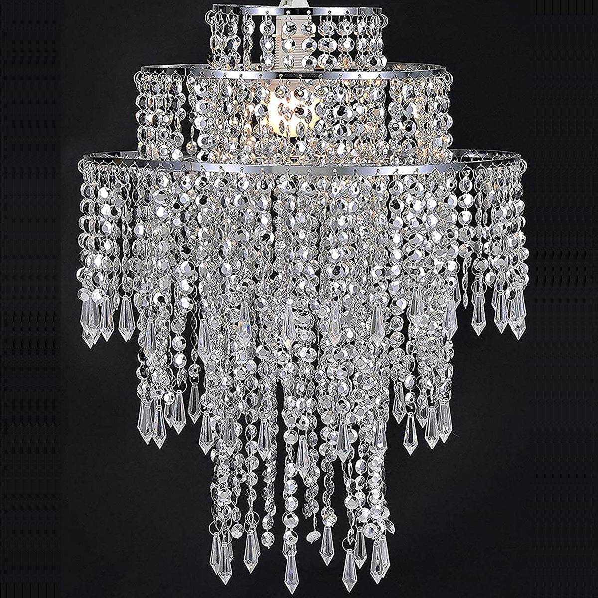Our Liza easy fit ceiling pendant shade features polished chrome circular rings with varying lengths of acrylic crystal strands.  This beautiful easy fit pendant shade will add glamour to any space whilst instantly updating your room without the need of an electrician. 