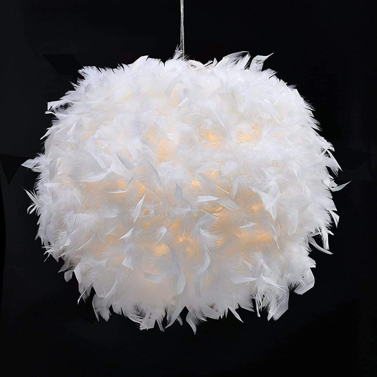 Our Rio easy fit white feather lamp shade is constructed from delicate feathers in a large round shape. This beautiful shade is perfect for adding a touch of fun and elegance to your room. Can be used as either a table lamp shade or a ce