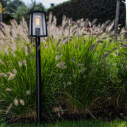 Our stylish outdoor lantern post light is made from a high-quality fully weather and rust proof black metal material and is complimented with a clear glass wet look diffuser. The modern and contemporary design would suit modern and traditional homes.