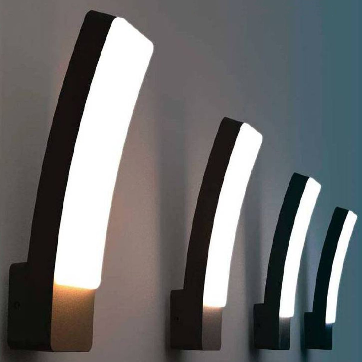 Our Alana dark grey curved wall light combines style and energy efficiency. Perfect for lighting outside modern homes driveways, patios, gardens as well as bars, clubs, hotels. Matching post light available.