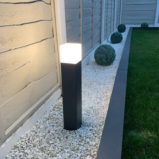 Our Amara dark grey outdoor square post light would look perfect in a modern or more traditional garden design. Outside wall lights can provide atmospheric light in your garden, at the front door or on the terrace as well as a great security solution. It is designed for durability and longevity with its robust material producing a fully weatherproof and water resistant light fitting. Use an LED bulb to make this fitting energy efficient.