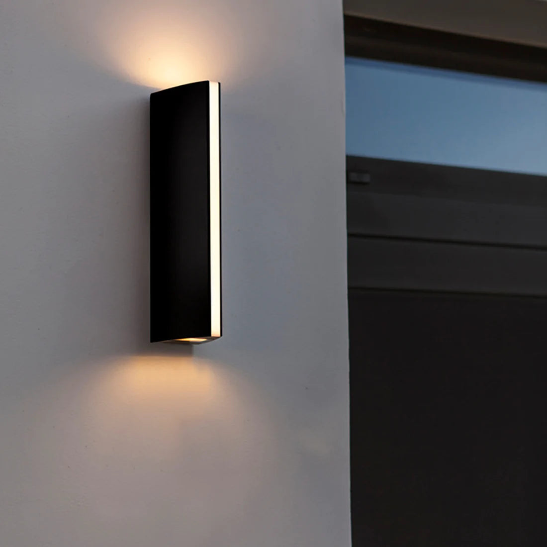 Our Wendy dark grey outdoor wall mounted geometric outdoor wall light would look perfect in a modern or more traditional home design. Outside wall lights can provide atmospheric light in your garden, at the front door or on the terrace as well as a great security solution. It is designed for durability and longevity with its robust material producing a fully weatherproof and water resistant light fitting. 