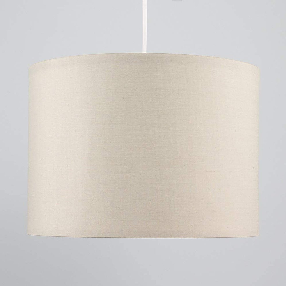 Our Lupo luxury cotton shade is sophisticated in appearance and we have designed the shade to suit a range of interiors. Easy to fit, it’s crafted from high-quality cotton on the outer and has a reflective silver metallic inner. It's made to fit both a ceiling light or lamp base.