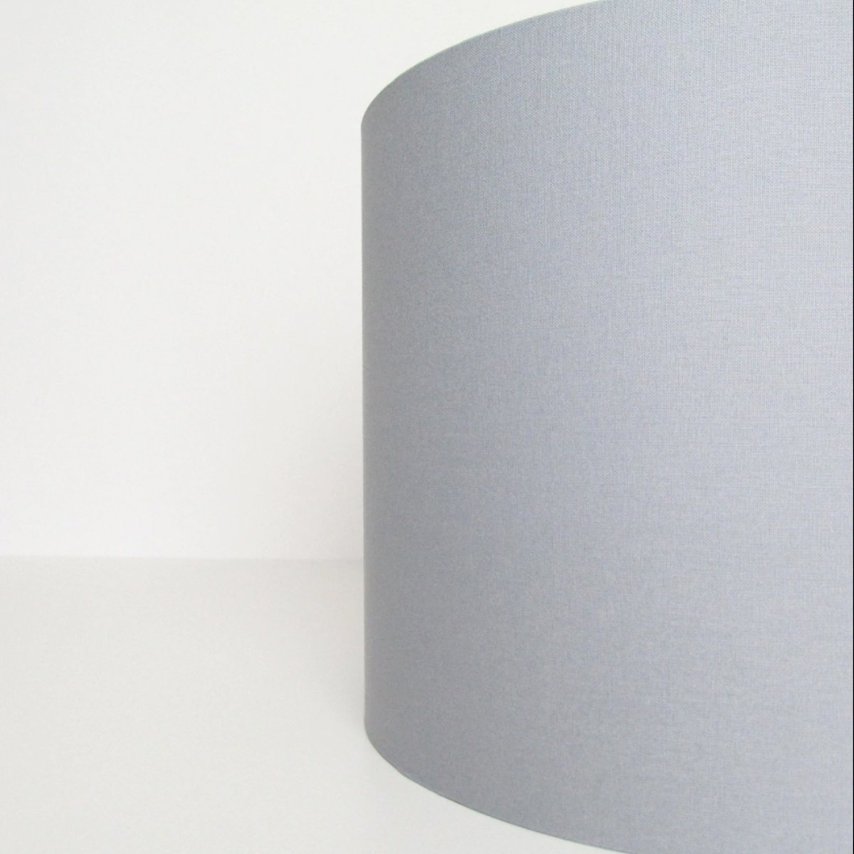 Our Lupo luxury cotton shade is sophisticated in appearance and we have designed the shade to suit a range of interiors. Easy to fit, it’s crafted from high-quality cotton on the outer and has a reflective silver metallic inner. It's made to fit both a ceiling light or lamp base.