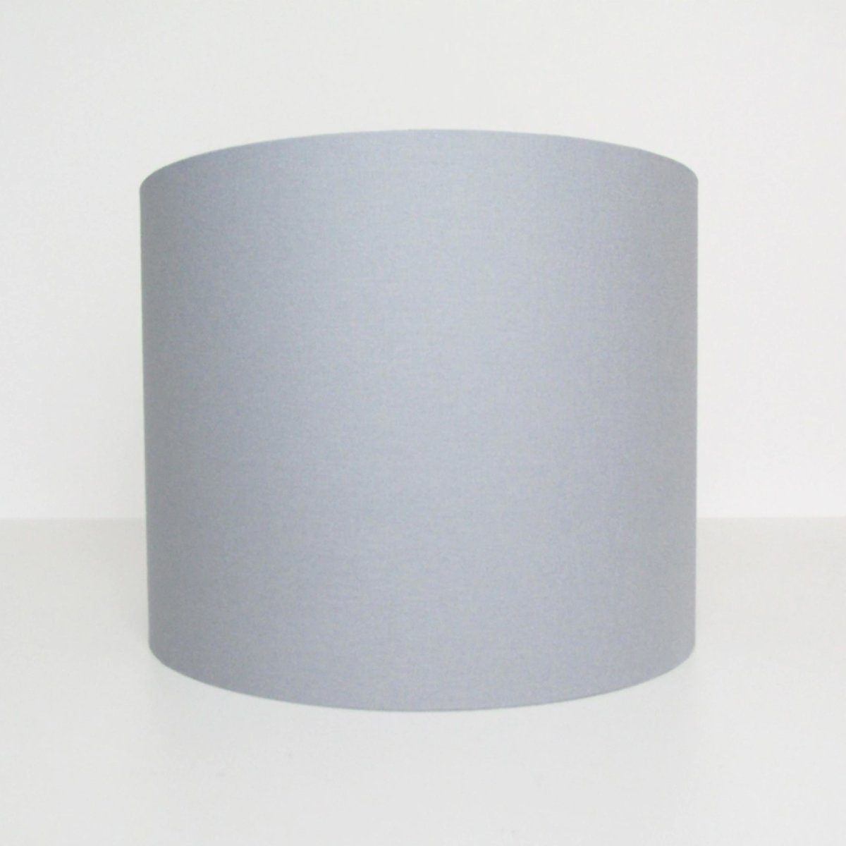 Our Lupo luxury cotton shade is sophisticated in appearance and we have designed the shade to suit a range of interiors. Easy to fit, it’s crafted from high-quality cotton on the outer and has a reflective silver metallic inner. It's made to fit both a ceiling light or lamp base.