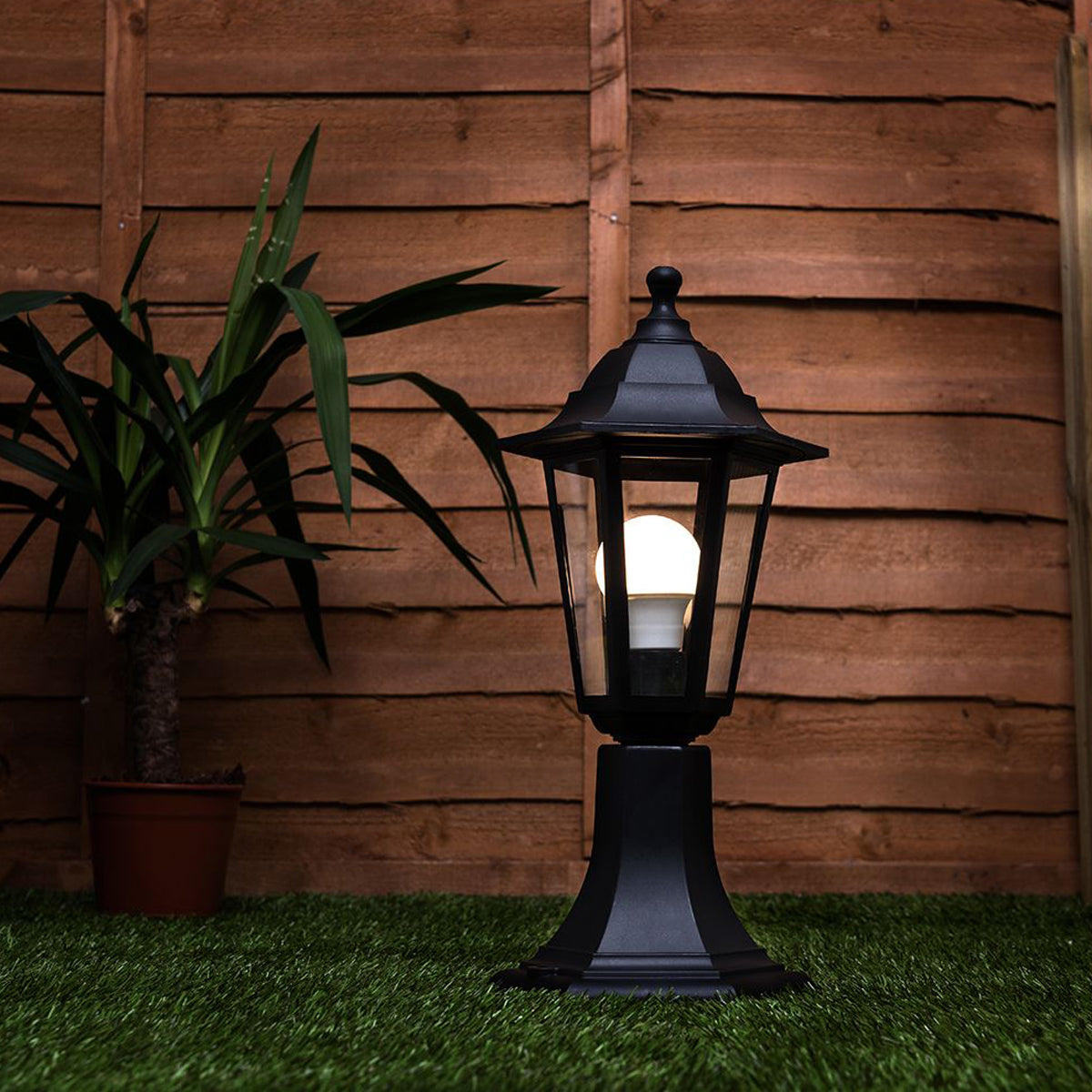 Our Yasmin lantern delivers on style and durability and is a smart choice for your exterior lighting. With its black polycarbonate construction teamed with clear polycarbonate panes, this lantern is hardwearing and rust and weatherproof. Built for life outdoors, it has an IP44 rating which means it can withstand the harshest of weather conditions. For sophisticated yet robust outdoor lighting, our Yasmin black outdoor traditional lantern is a strong contender.