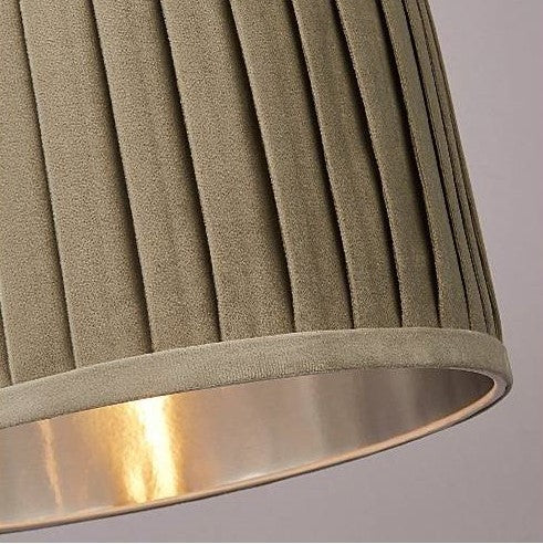 Our green Harper luxury velvet pleated shade is glamorous in appearance and we have designed the shade to suit a range of interiors. Easy to fit, it’s crafted from high-quality green velvet complimented with a silver reflective inner. It's made to fit both a ceiling light or lamp base.