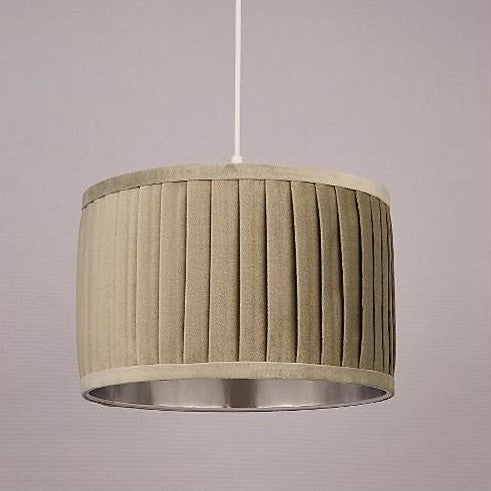 Our green Harper luxury velvet pleated shade is glamorous in appearance and we have designed the shade to suit a range of interiors. Easy to fit, it’s crafted from high-quality green velvet complimented with a silver reflective inner. It's made to fit both a ceiling light or lamp base.