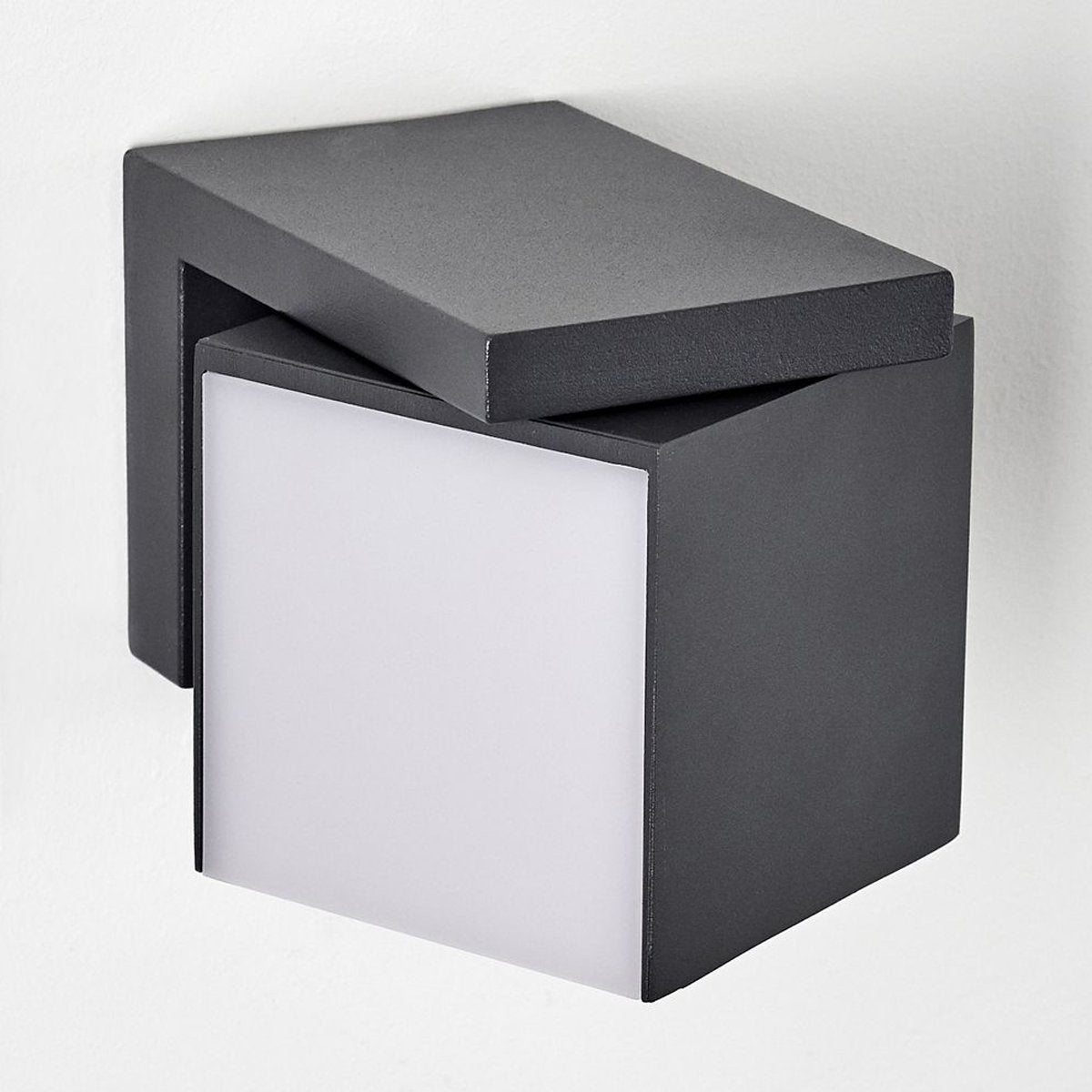 Come browse our Morgan dark grey outdoor wall light by CGC Interiors. This cube light can be mounted onto a wall on your home’s exterior space, creating an atmospheric lighting system for your garden, front door, or even on your driveway to provide an extra security solution. 