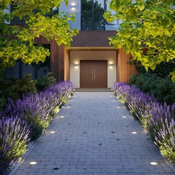 Walkover lamps are a category of products created to complement gardens, paths, driveways and the surroundings of houses. While maintaining full comfort of use, that we can enjoy cosy lighting, increasing safety and at the same time taking care of a refined visual style.