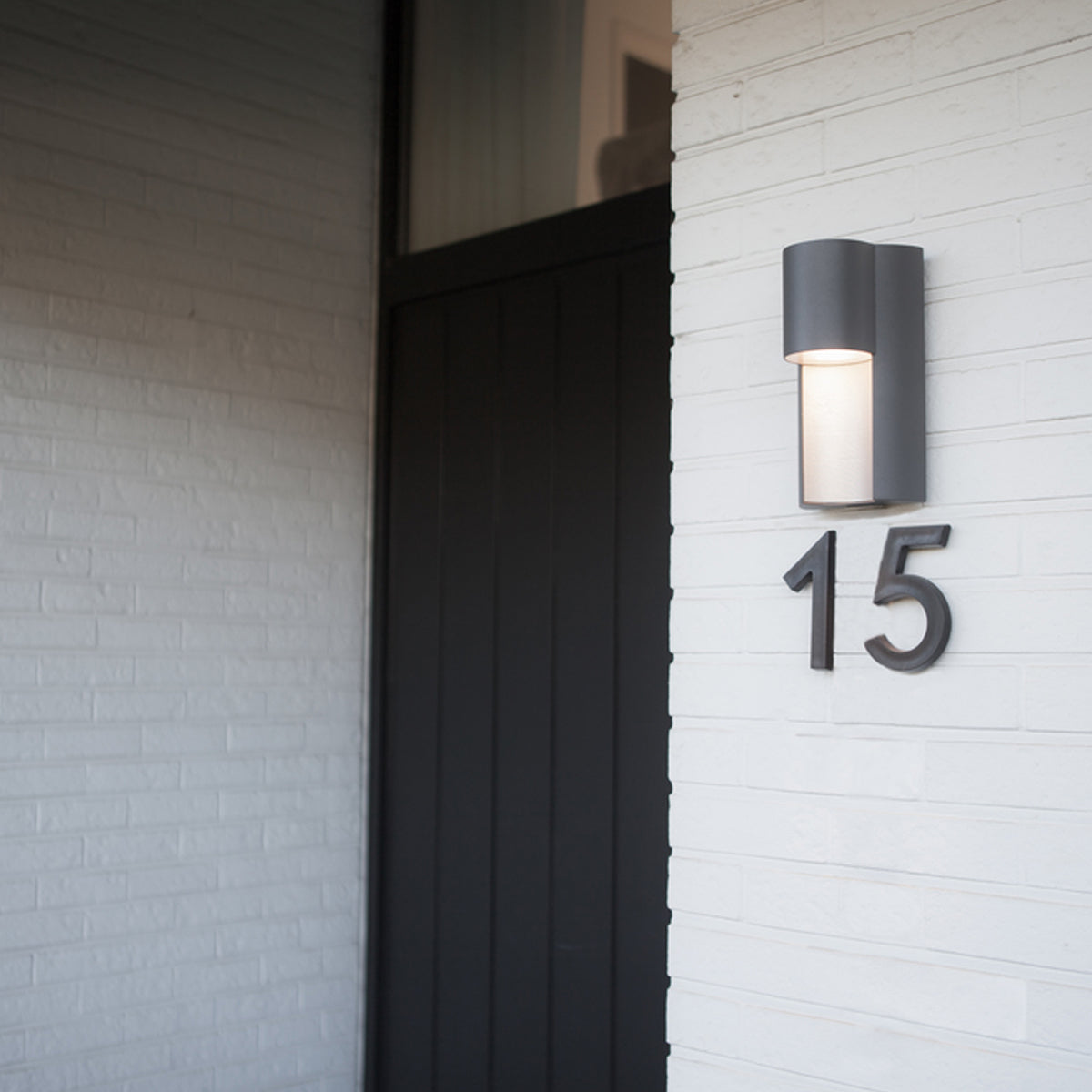 Our Gemma dark grey outdoor curved wall light would look perfect in a modern or more traditional home design. Outside wall lights can provide atmospheric light in your garden, at the front door or on the terrace as well as a great security solution. It is designed for durability and longevity with its robust material producing a fully weatherproof and water resistant light fitting. Use LED bulbs to make this light energy efficient and low cost to run