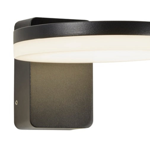 Our Mitch black die cast aluminum outdoor wall light is slim round modern in its design and has a white 4000k natural white built in 12W LED 700lm. Suitable for indoor or outdoor use. It comes in a round plate design mounted on a rectangular back plate. It is designed for durability and longevity with its robust material producing a fully weatherproof and water resistant light fitting IP65 rating.