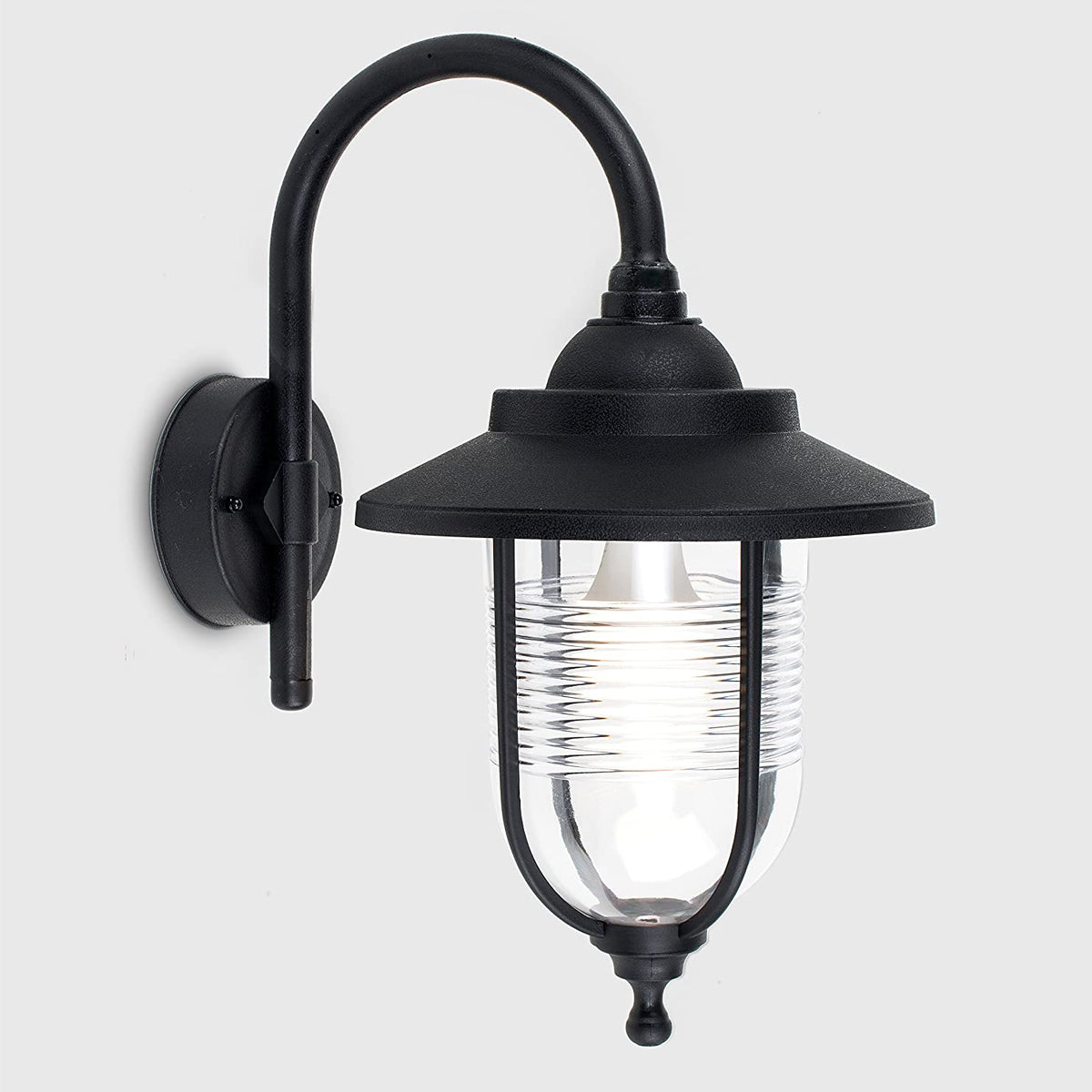 The Evelyn black fisherman hooked outdoor wall lantern light is constructed of a black weatherproof metal and features an attractive design inspired by traditional lighting styles. This lantern wall light is a great choice for illuminating doorways, porches wall or patios, creating a warm and inviting look and a safe environment. With an IP44 safety rating, the Evelyn wall light is suitable for mounting on outdoor walls.