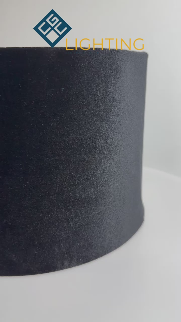 Load video: Our Nila velvet shade is sophisticated in appearance and we have designed the shade to  suit a range of interiors. Easy to fit, it’s crafted from high-quality velvet on the outer and has a reflective gold metallic inner. It&#39;s made to fit both a ceiling light or lamp base.