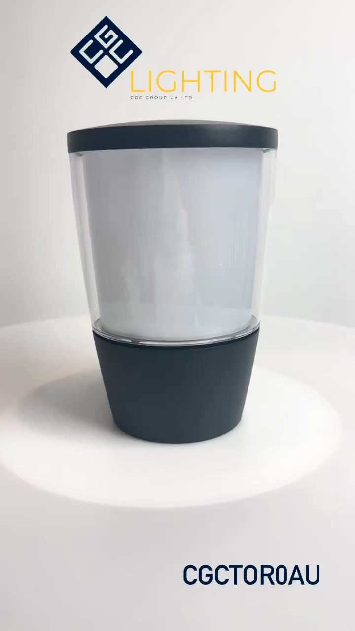 Load video: Our Toro wall light looks great in modern and traditional spaces. Our wall light has a simple round design, and its aluminium body is complemented by an opal diffuser. This wall light is perfect for any outdoor space requiring light and security such as gardens, driveways, doorways work spaces, pubs and hotels.