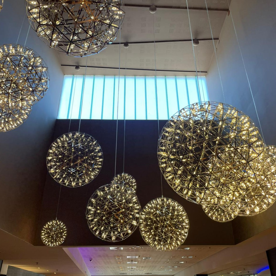 Our striking 80cm XXL large silver starburst light is the perfect way to make a statement with your interiors. It is inspired by elements of the night sky, comprising of a delicately crafted stainless steel round spherical shape and perfectly finished in LED lights