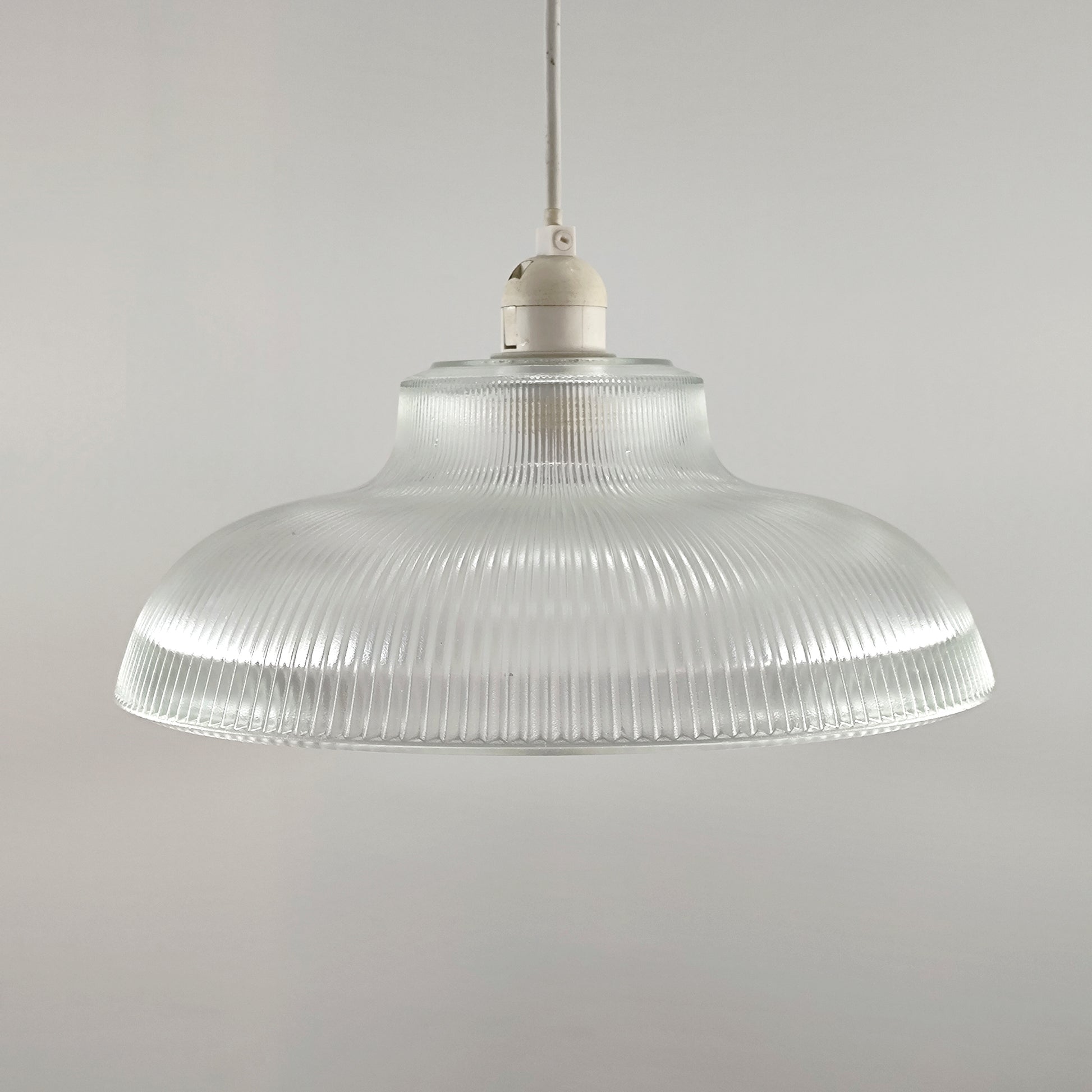 Glass lighting has proven very popular in the lighting sector, and we are extremely happy to introduce the Jacinta to our range. Our ribbed glass easy fit light pendant is a very attractive light fitting and easy fit means you can give your room a makeover by simply attaching it to an existing light fitting. 