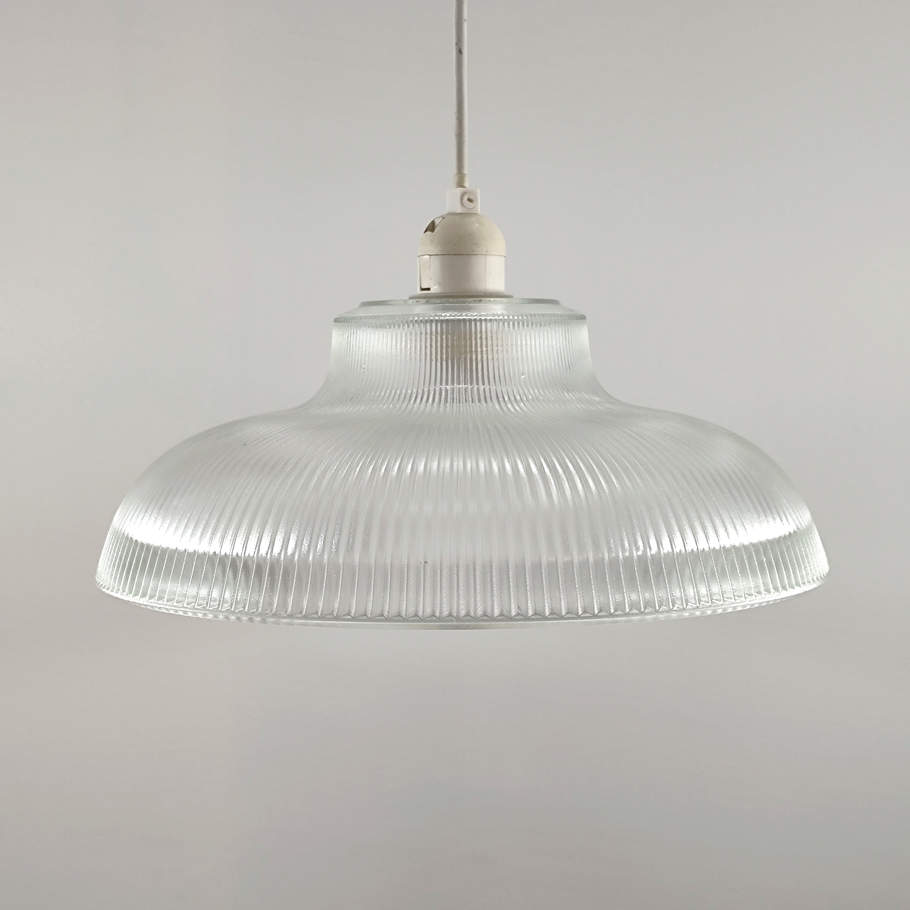 Glass lighting has proven very popular in the lighting sector, and we are extremely happy to introduce the Jacinta to our range. Our ribbed glass easy fit light pendant is a very attractive light fitting and easy fit means you can give your room a makeover by simply attaching it to an existing light fitting. 