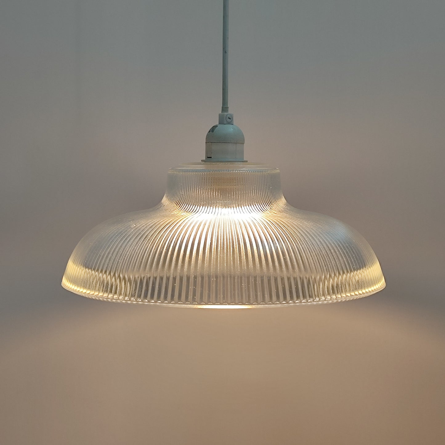 Glass lighting has proven very popular in the lighting sector, and we are extremely happy to introduce the Jacinta to our range. Our ribbed glass easy fit light pendant is a very attractive light fitting and easy fit means you can give your room a makeover by simply attaching it to an existing light fitting. 